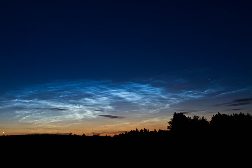 Noctilucent clouds at sunset. Photo by Flickr user jepaulsen.