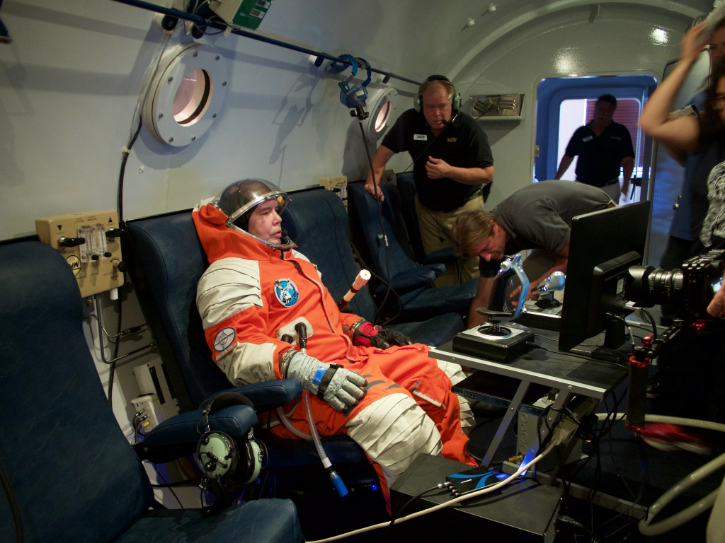 Captain Richard Blakeman prepares for a simulated ascent to 22,000 feet in the Final Frontier Design spacesuit. 